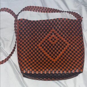 Black and Orange Plastic Crossbody Bag with Woven Checkered Design